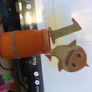 A cup orange and it baby shark thing for Decour